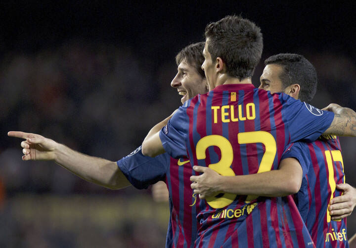 Cristian Tello con Messi en 2012. (EFE)